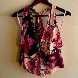 NWT Free People tank. Beautiful colors and design. Size large.